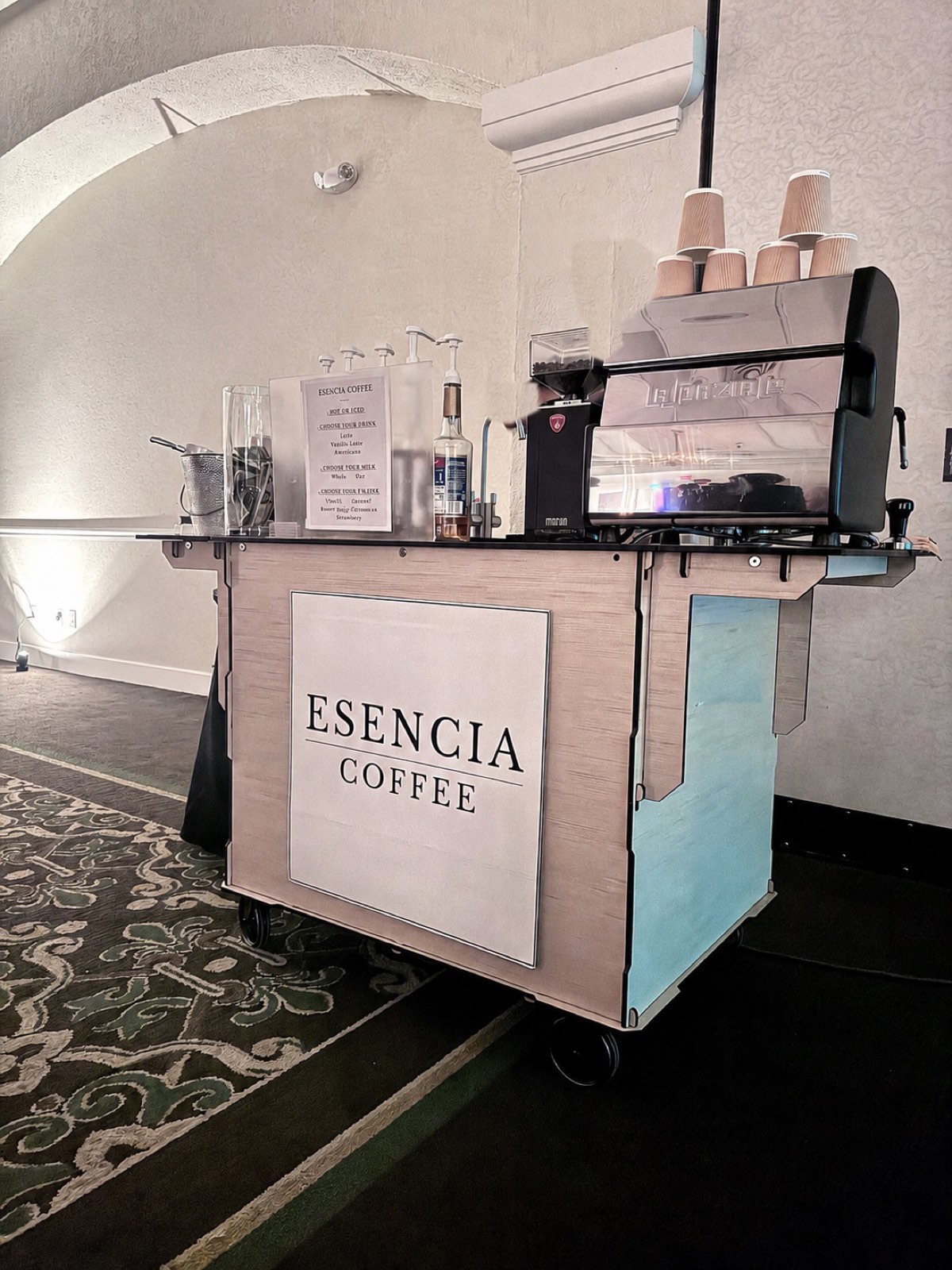 Esencia Coffee espresso cart set up at an elegant event venue